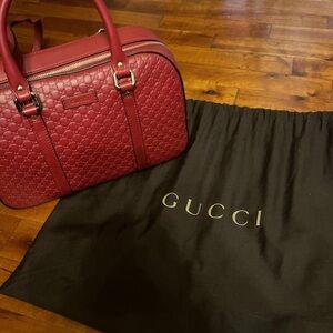 red gucci bag.